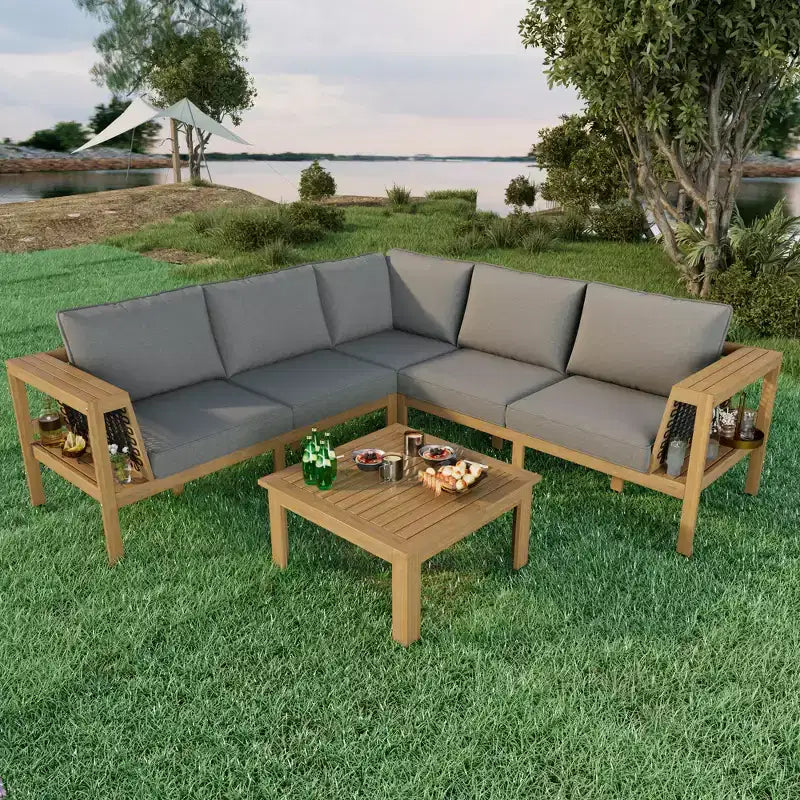 Ensemble de canapés de jardin 4 pièces en bois d'acacia Merax avec table basse et pieds réglables