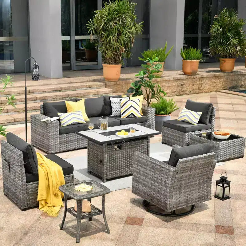 Ensemble de mobilier de patio d'extérieur en osier Marlton 9 pièces avec canapé de conversation, brasero rectangulaire, fauteuil pivotant et coussins