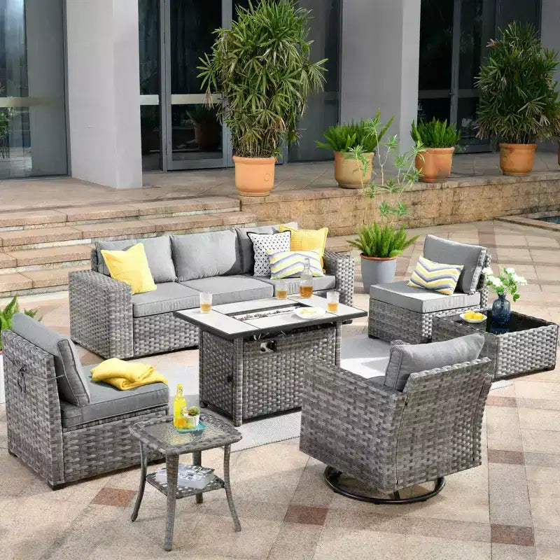 Ensemble de mobilier de patio d'extérieur en osier Marlton 9 pièces avec canapé de conversation, brasero rectangulaire, fauteuil pivotant et coussins