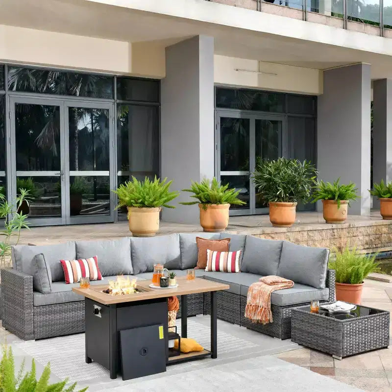 Ensemble de meubles de patio extérieur en osier 8 pièces Ovios Venice avec canapé conversationnel, foyer de rangement et coussins