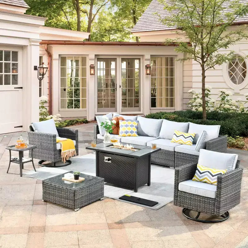 Ensemble de meubles de patio d'extérieur en osier Ovios Venice 9 pièces avec foyer en métal, fauteuils pivotants et coussins